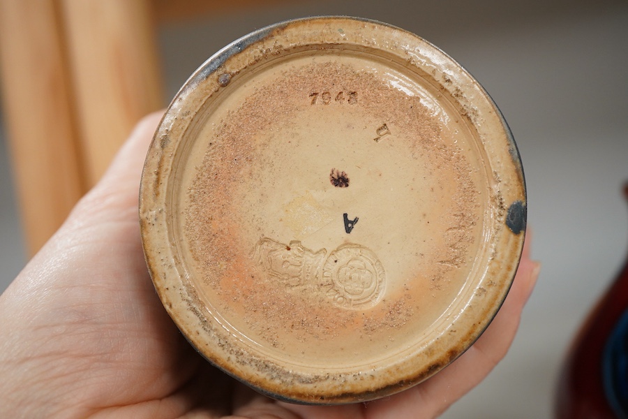 A Royal Doulton pottery vase and a Poole pottery Delphis vase, tallest 20.5cm